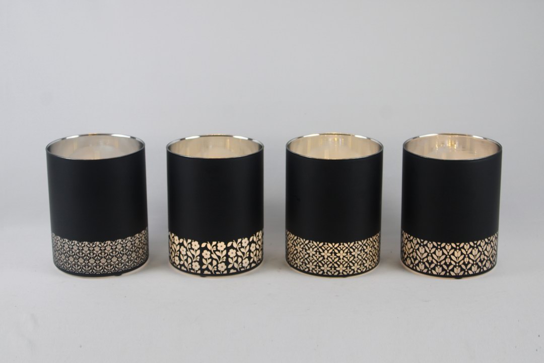 Four decorative glass planter designs with illuminated exterior patterns.