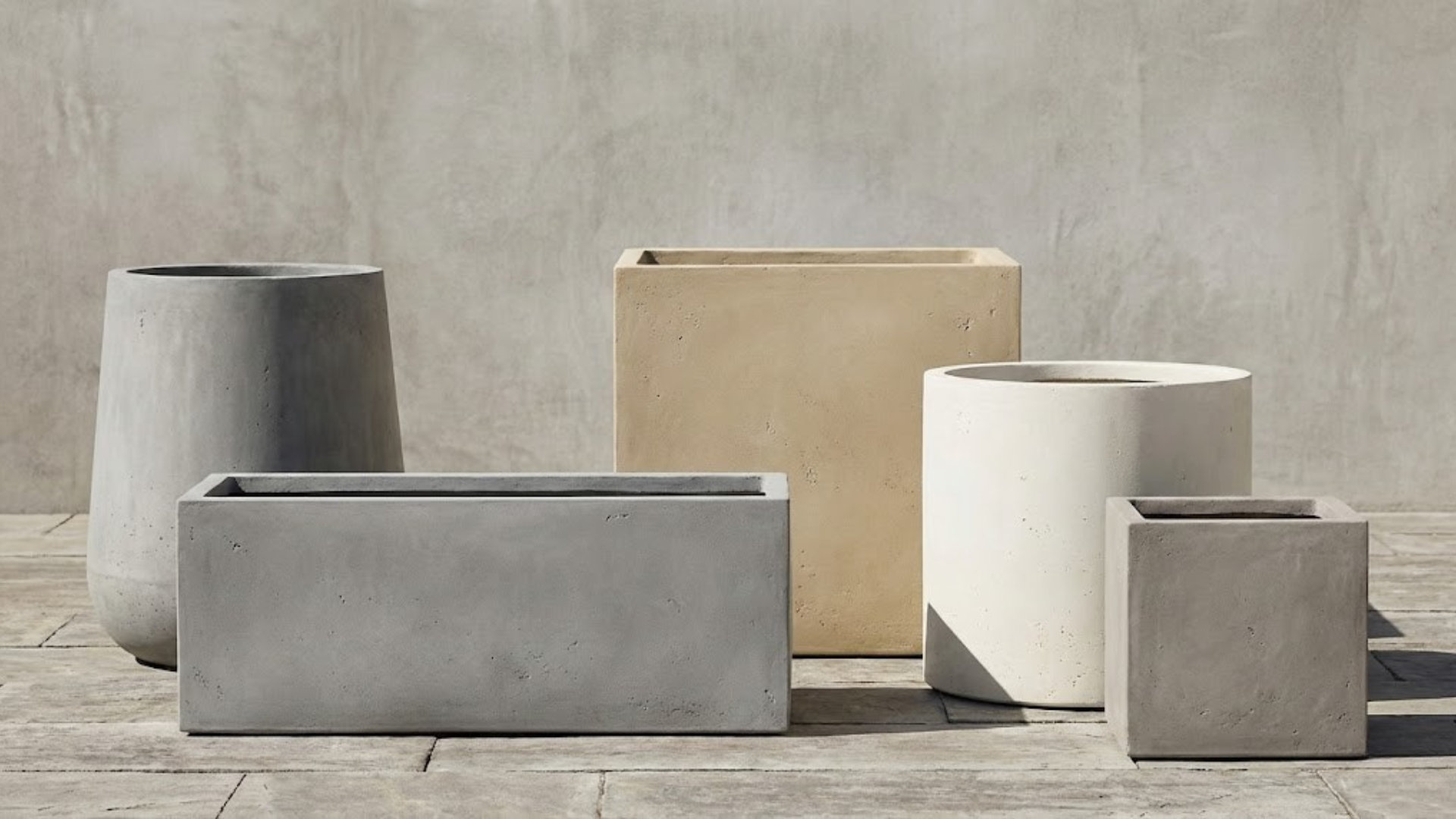 Cement and fiber cement planter samples showing surface texture, rim profiles and wall thickness